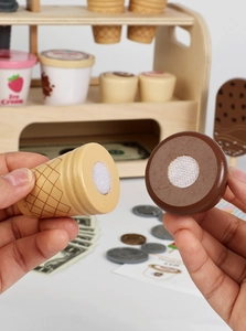 Detail of wooden ice cream toy set with velcro parts for kids role play