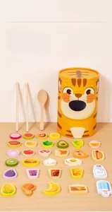 Detailed view of kids wooden feeding game with tiger bucket and colorful food pieces