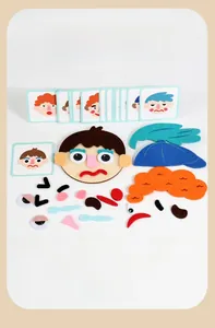 Felt face puzzle detail with detachable facial features and emotion reference cards