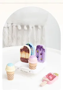 Macro shot of colorful wooden ice cream toy set with a branded white display stand
