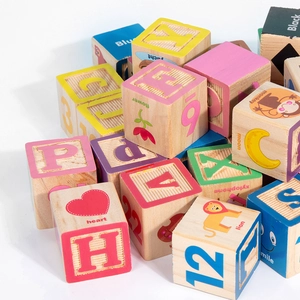 Educational wooden blocks for kids featuring letters, numbers, and colorful animal patterns