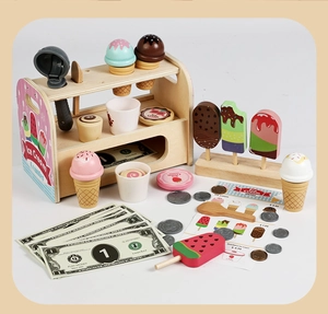 Detail of wooden ice cream counter set with scoops, cones, play money and menu accessories