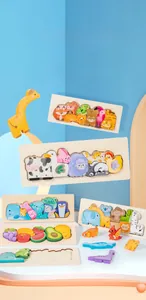 Close-up of double-sided wooden animal puzzle blocks for toddler cognitive skill training