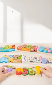 Detail of wooden animal and fruit 3D puzzle blocks for kids early education