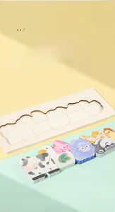 Close-up of wooden puzzle with animal pieces and matching outlines for toddlers