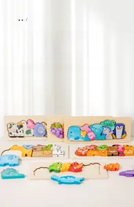 Close-up of assorted colorful wooden animal puzzle blocks for early toddler development