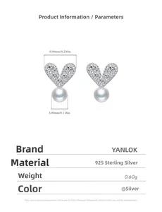 Detailed view of silver heart stud earrings with crystal pave and white pearl drop