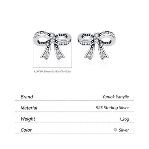 Vintage S925 sterling silver bow stud earrings with sparkling cubic zirconia stones