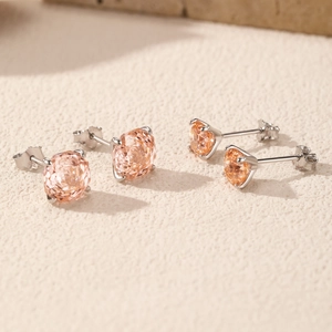 Boucles d'oreilles s925 en argent avec cristaux orange champagne et serti à quatre griffes