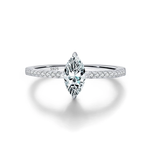 Polished S925 sterling silver ring with marquise cut moissanite and side stones on white base