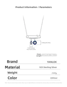 Detail of S925 sterling silver safety pin necklace with Hand of Fatima and Evil Eye charms