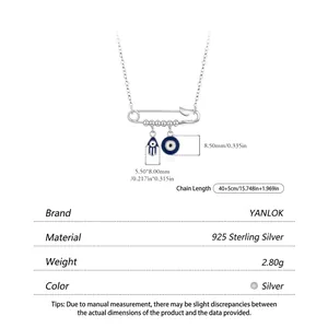 S925 sterling silver safety pin necklace featuring Hamsa and Evil Eye charm pendants