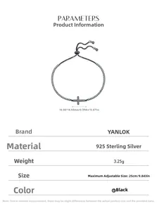 Macro detail of S925 sterling silver cross charm bracelet with cubic zirconia in black finish