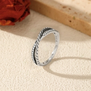 Vintage S925 sterling silver crisscross twist ring with micro-set sparkling zircon stones
