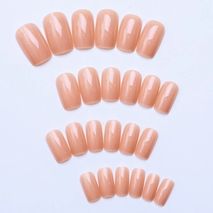 Detailed grid of solid nude pink medium square glossy press-on nails in various sizes