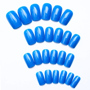 Flat lay of glossy bright blue medium-length square press-on nails in various sizes