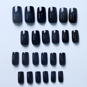 Macro display of 24 pieces set of glossy black medium square artificial press-on nails