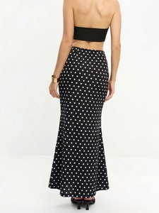 Jupe midi sirène élégante à pois noirs et blancs avec taille haute vue de l'arrière