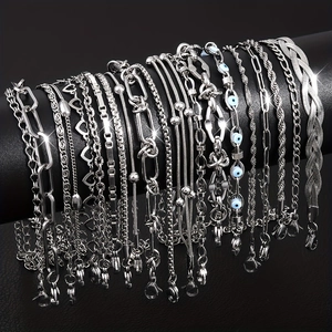 Collection of silver stainless steel bracelets featuring evil eye and heart charms