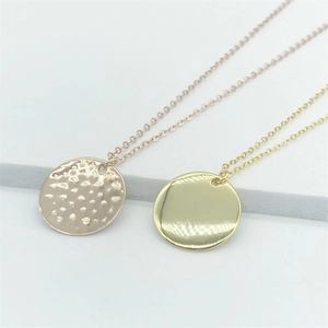 S925 sterling silver necklaces featuring hammered and polished round pendants