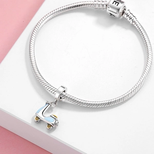 S925 sterling silver snake chain bracelet with a blue enamel scooter charm pendant