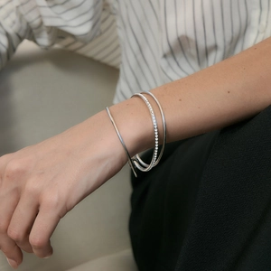 Three-piece set of silver stainless steel bracelets with cubic zirconia and T-bar design