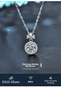 Macro shot of S925 sterling silver perfume bottle pendant with moissanite and bow detail