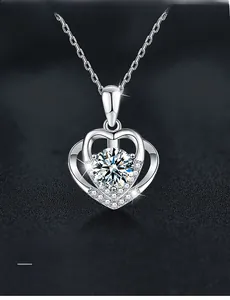 Macro detail of S925 silver heart necklace with Moissanite pendant and brilliant cut