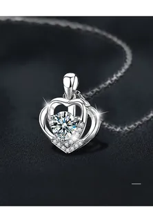 Macro detail of S925 sterling silver heart necklace with moissanite and plating