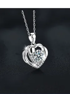 Macro view of S925 sterling silver double heart necklace with moissanite pendant