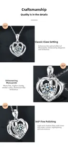 Detailed view of heart moissanite necklace with classic claw setting and polished finish