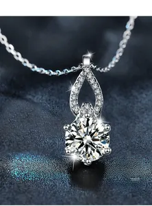 Macro detail of a six-prong moissanite pendant with 0.03mm silver plated finish on O-chain