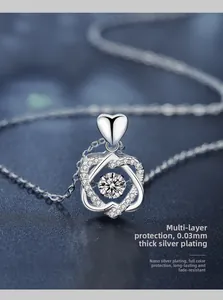 Macro detail of silver heart necklace featuring thick silver plating and nano color protection