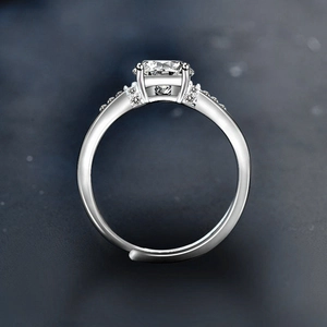 Adjustable S925 sterling silver ring with four-prong moissanite and side stones