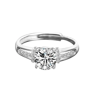 Elegant S925 sterling silver four-prong solitaire ring with side diamond accents