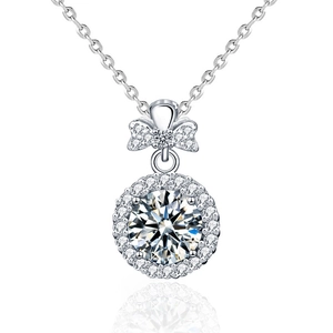 Moissanite S925 silver necklace with bowknot pendant and round halo stone on white background