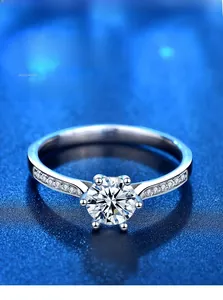 Macro shot of 925 silver ring with 3EX cut moissanite and eight hearts and arrows detail
