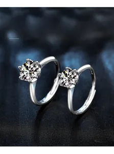 Close-up of 1ct and 2ct moissanite rings featuring 3EX cut and classic six-prong setting