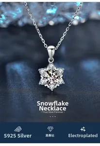 Macro detail of S925 sterling silver snowflake pendant featuring a brilliant moissanite stone