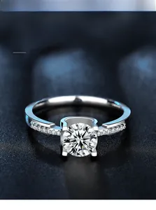 Detailed macro view of 925 sterling silver moissanite ring with 3EX 58 facets and 8 hearts 8 arrows