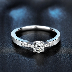 Classic 925 sterling silver moissanite ring with four-prong setting and side diamonds
