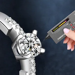 Moissanite ring in 925 silver tested by a diamond tester showing brilliant sparkle