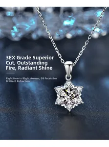 Macro detail of snowflake necklace with 3EX cut moissanite and eight hearts and arrows