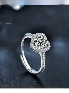 Detailed macro view of 925 silver heart ring with 3EX cut moissanite and 58 facets