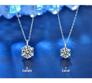 Comparison of one and two carat round moissanite pendants in S925 sterling silver