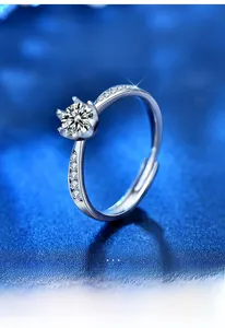 Macro detail of Moissanite ring in S925 sterling silver with six-prong setting and sparkles