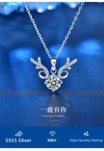 Macro detail of antler-shaped S925 silver pendant necklace with sparkling moissanite stone
