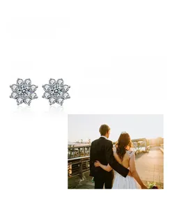 Macro view of sunflower moissanite earrings in 925 sterling silver flower design