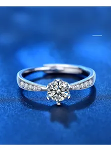 Macro shot of S925 sterling silver ring with six-prong moissanite and adjustable band