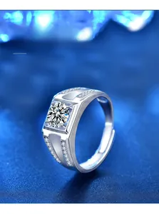 Detailed close-up of a 925 silver men's moissanite ring with brilliant fire and adjustable band